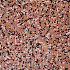 Terrazzo PP10 Carodeco fond rose terracotta avec éclats de marbre noir, blanc, vert et ocre, motif minéral graphique pour carrelage sol et mur intérieur